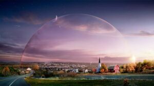 Cover image for the post about Silence. We see a small rural town under an orange sunset, completely covered by a huge dome of transparent and translucent energy. The dome represents the invisible frequency barrier that isolates the inhabitants of Silence from the external hearing world.